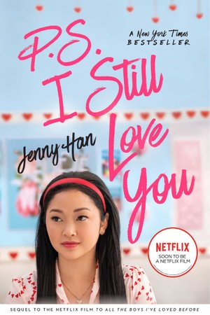 Lara Jean, a highschool girl, is wearing a red headband in a school classroom and is looking to the left side of the image. Typed out in handwritten font spells out the second bookÃƒÂ¢Ã¢â€šÂ¬Ã¢â€žÂ¢s title: P.S. I Still Love You. 